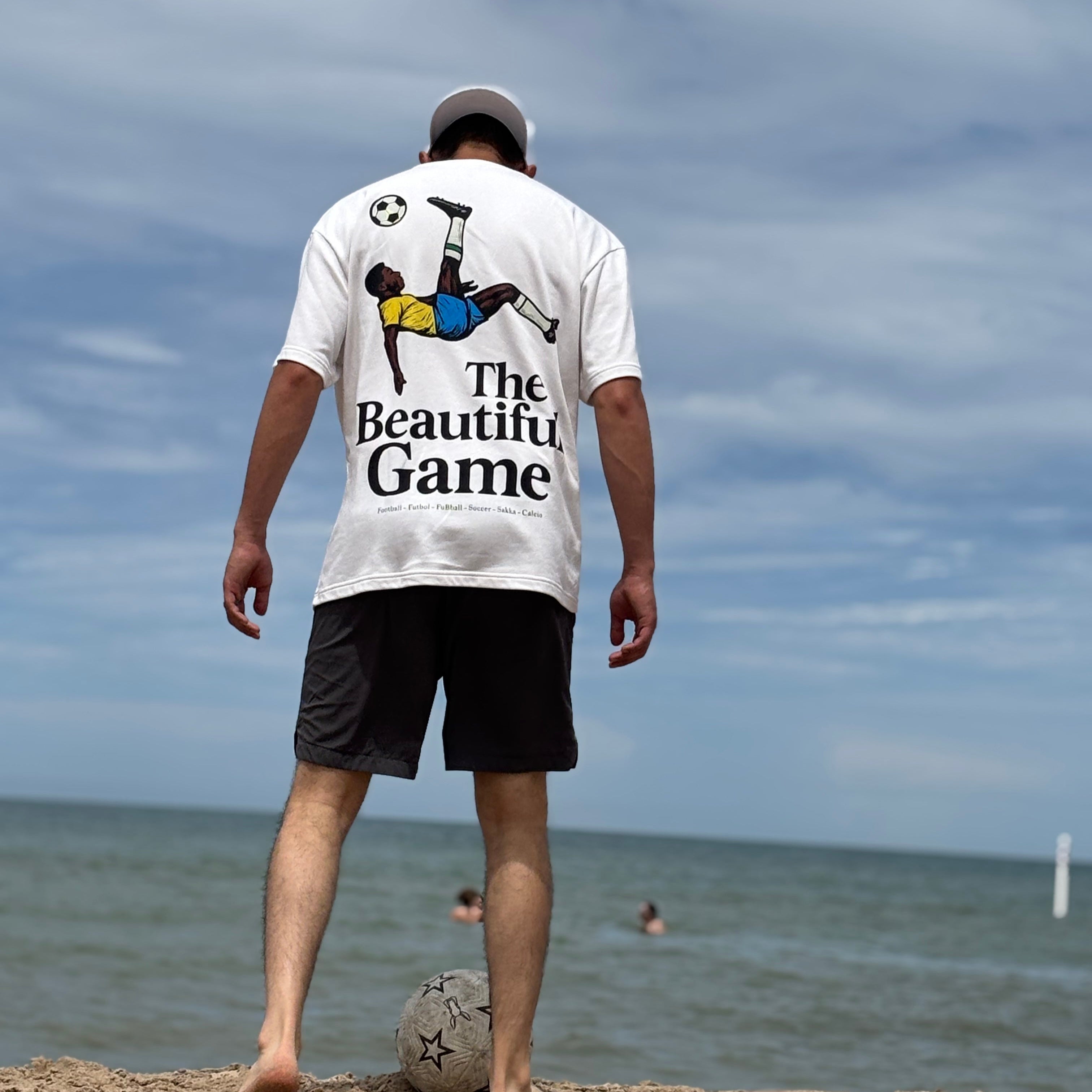 The Beautiful Game graphic tee, for soccer and football enthusiasts. Street wear to show your love of the world's sport.